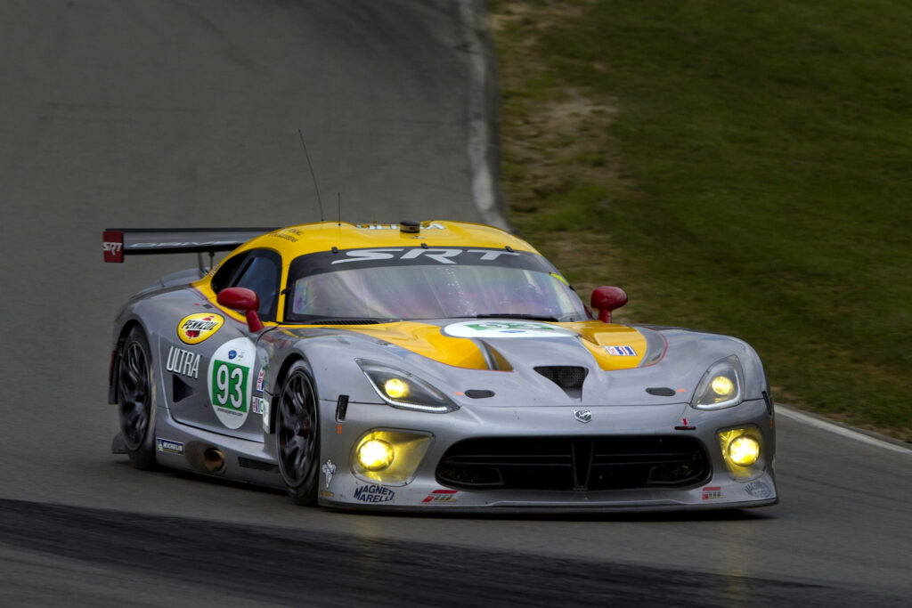 Dodge Viper GTS-R racing on winding road yellow gray livery bold graphics high performance wallpaper