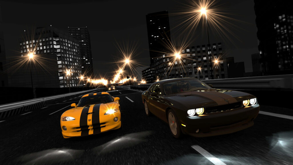 Dodge Vipers racing side by side at night city streetlights adrenaline intense car racing wallpaper