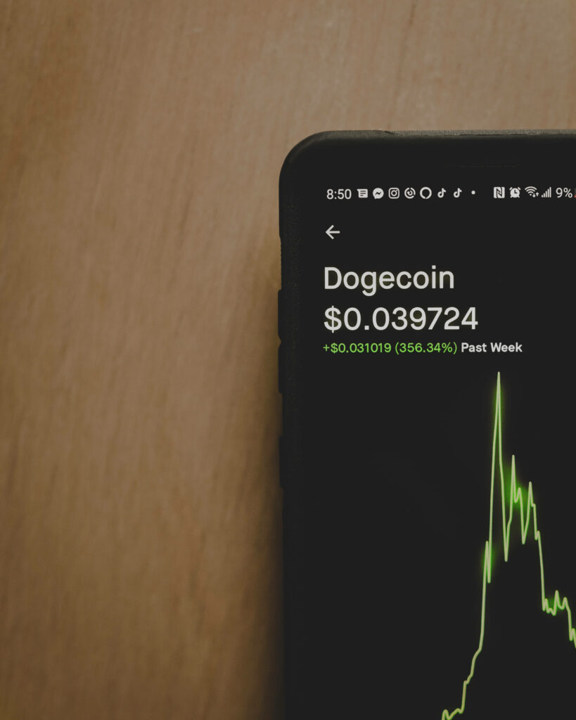Digital wallet wallpaper with Dogecoin logo and live price chart on modern smartphone screen