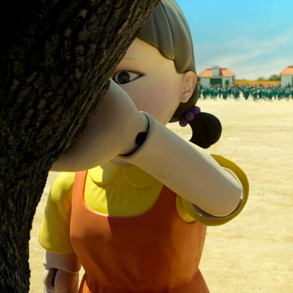 Intense Doll Monitoring Amidst Squid Game's Red Light, Green Light Spectacle Wallpaper