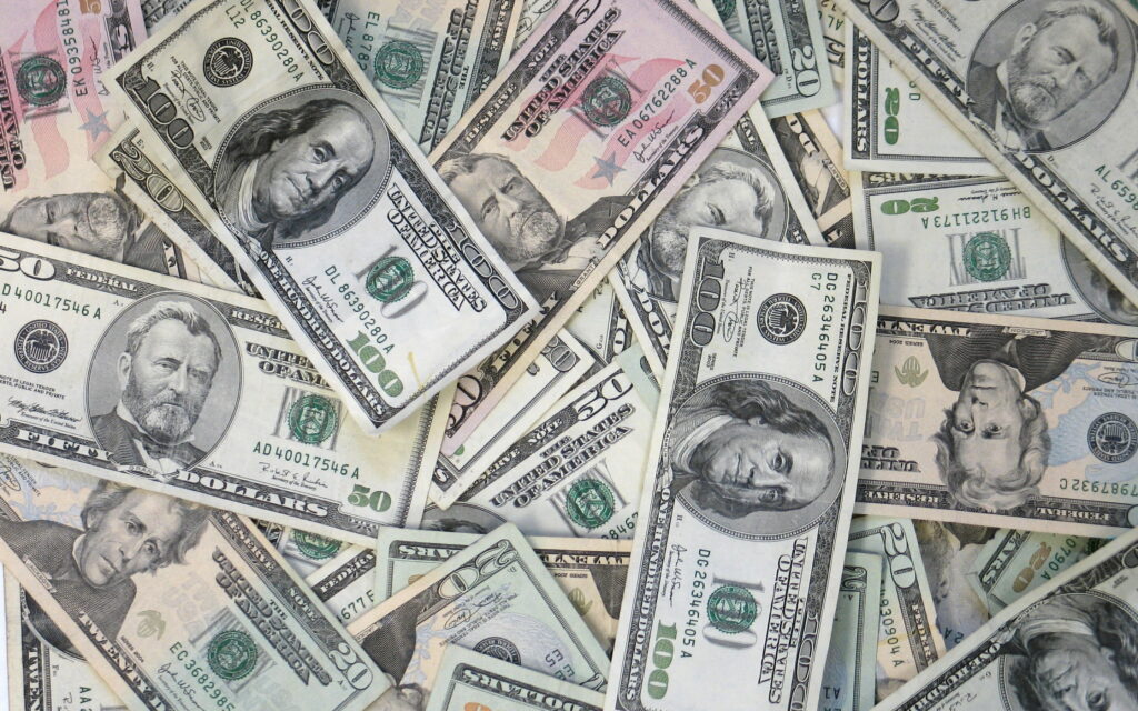 Monetary Mirage: A High-Definition Kaleidoscope of American Dollars Wallpaper