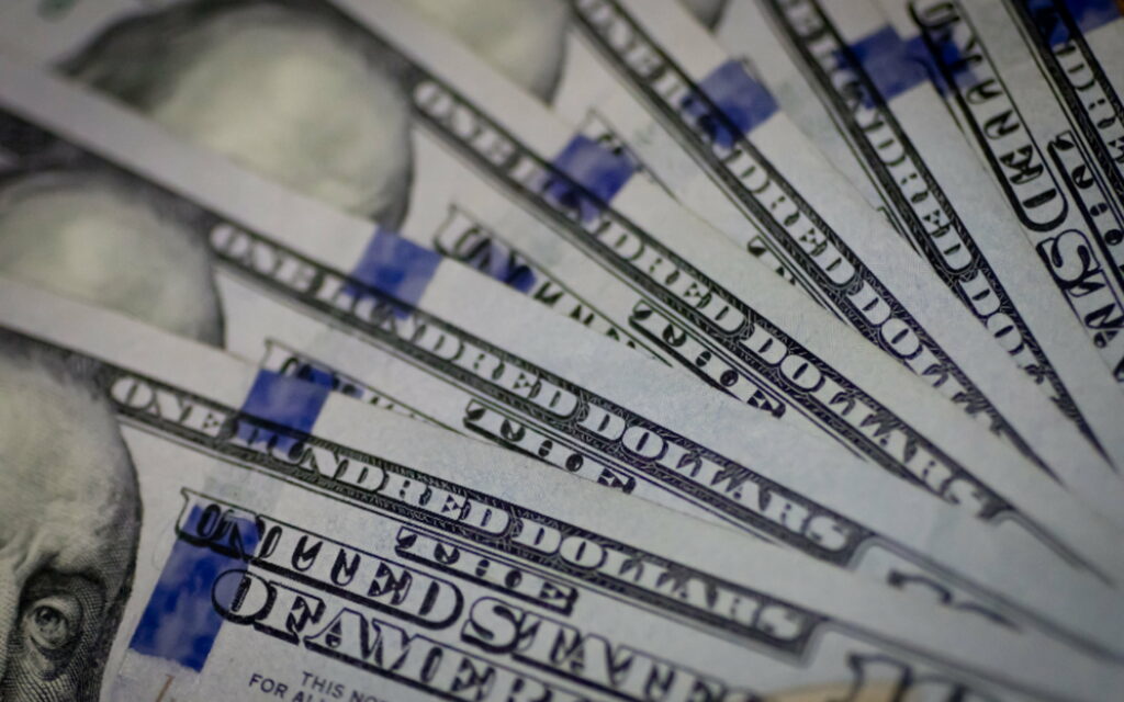 Fortune's Tapestry: A Wealth of American Currency adorns QHD Wallpaper