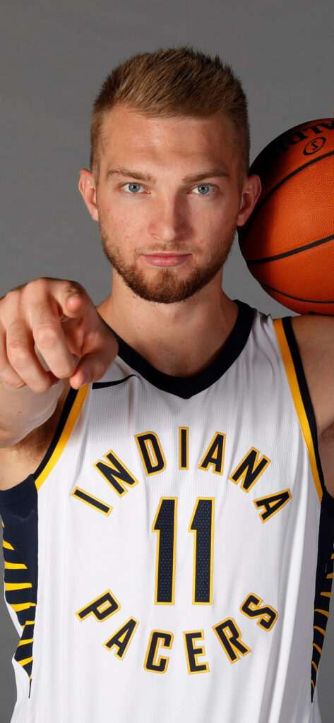 Domantas Sabonis Indiana Pacers jersey number 11 holding basketball pointing gray background wallpaper