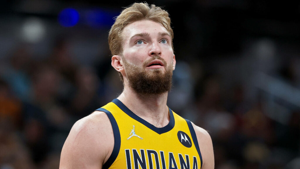 Domantas Sabonis Indiana Pacers wallpaper vibrant yellow navy blue intense basketball action