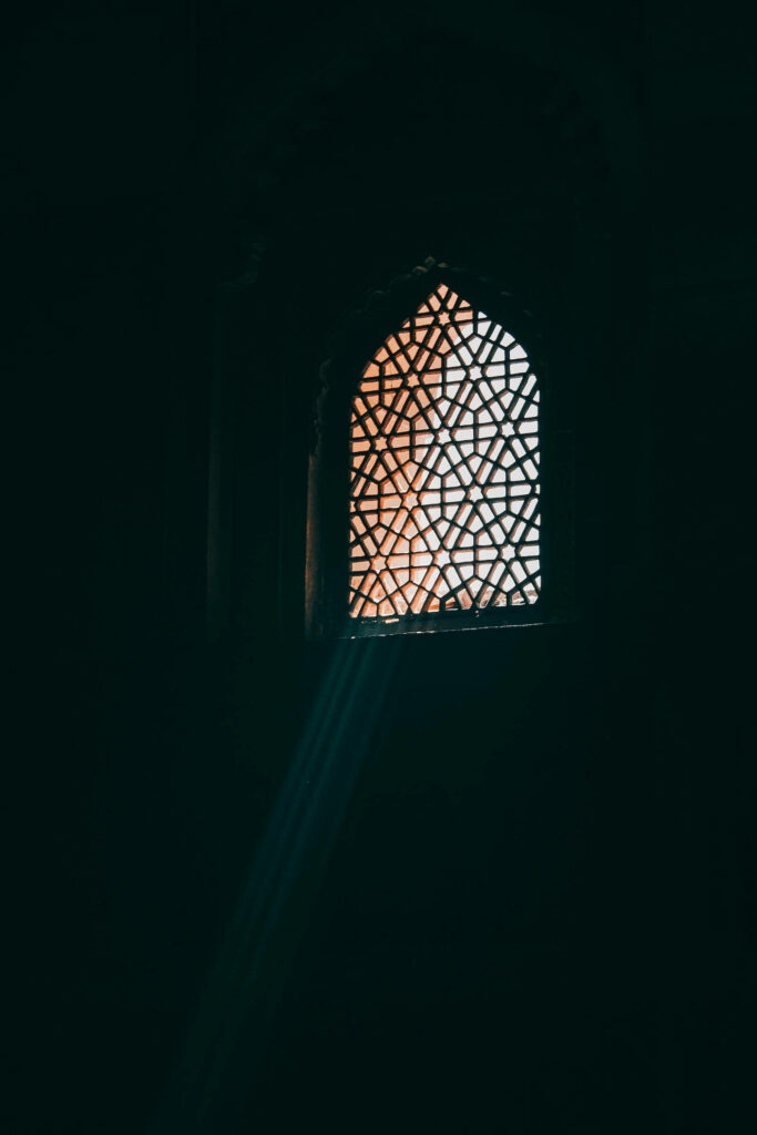 Majestic Architectural Splendor: Captivating Dome-shaped and Grilled Windows in an HD Islamic Background Photo Wallpaper