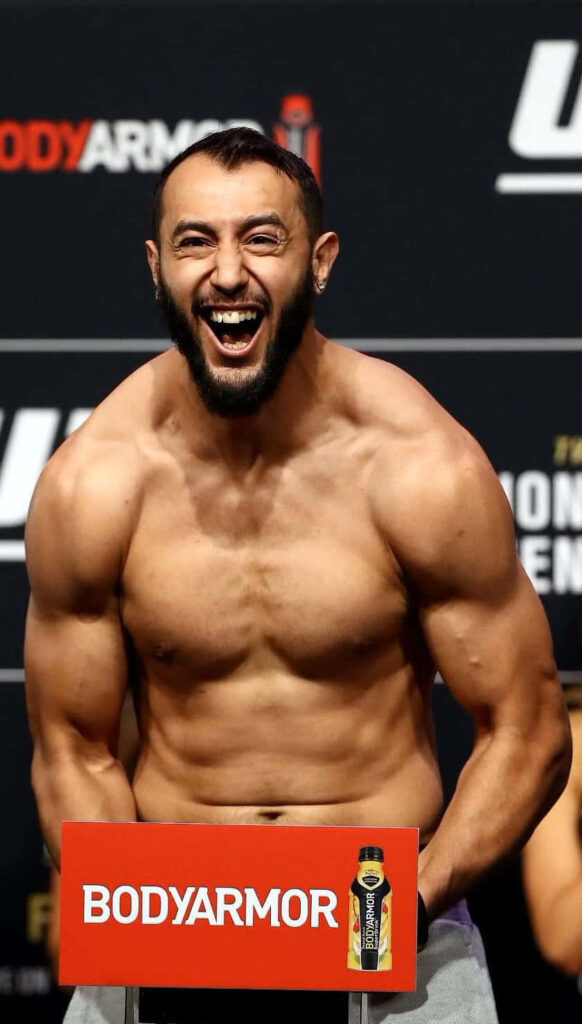 Dominick Reyes UFC weigh-in intense lighting muscular physique confident expression wallpaper