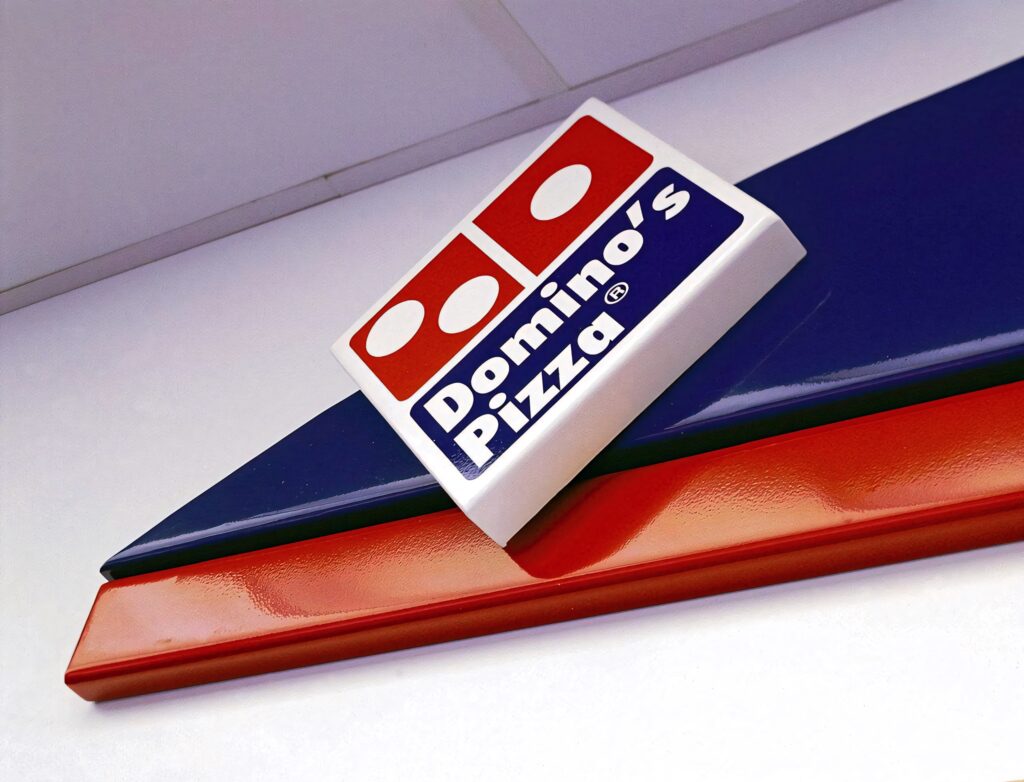 Dominos Pizza logo wallpaper diagonal red and blue modern backdrop iconic branding design