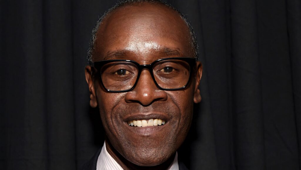 Don Cheadle close-up portrait with black-rimmed glasses dark background charismatic smile Wallpaper