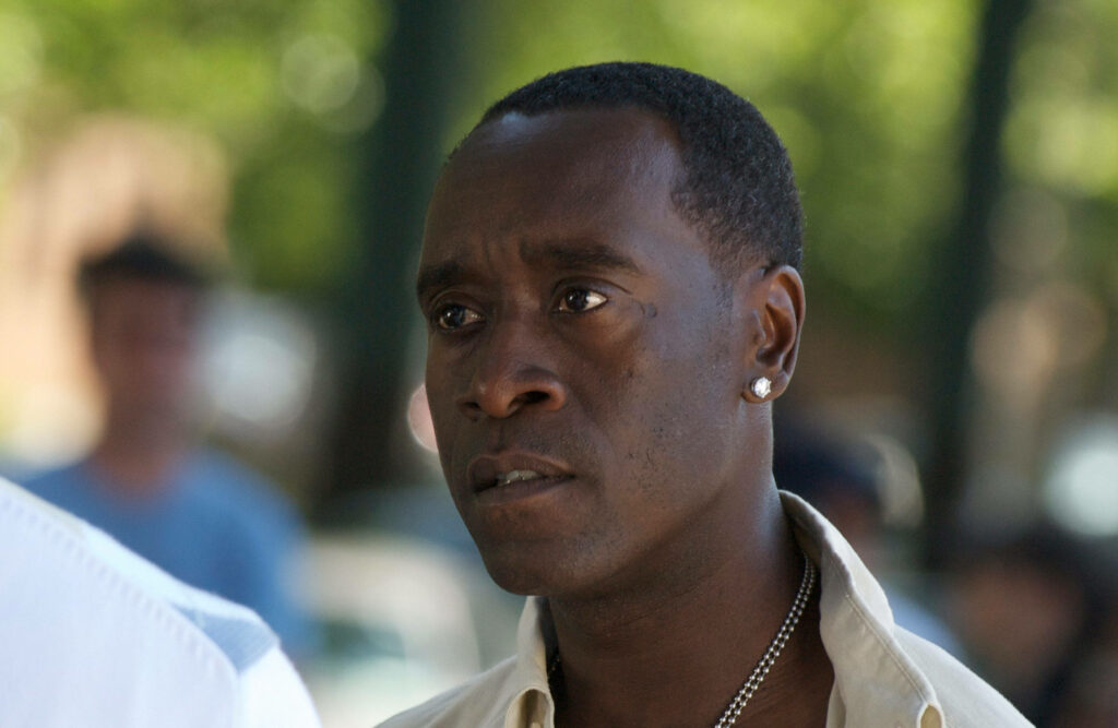 Don Cheadle close-up intense focused expression natural light emotional tension outdoor wallpaper