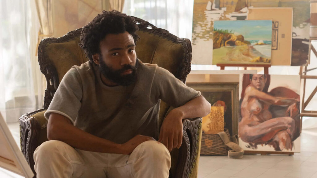 Artistic Wallpaper: Donald Glover in a Serene Studio Setting