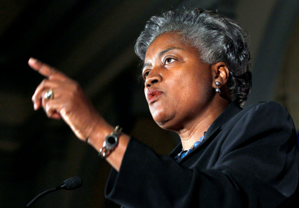 Donna Brazile speaking passionately at political event focused assertive expression close-up Wallpaper