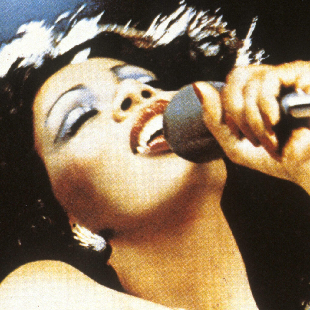 Donna Summer vibrant retro wallpaper bold colors close-up iconic 1970s disco queen energy