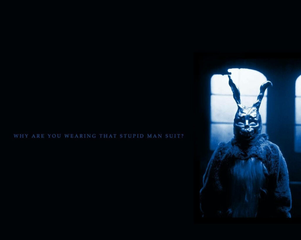 Donnie Darko Frank the Rabbit in eerie blue light dark minimalist wallpaper background