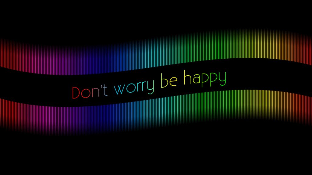 Motivational Dont worry be happy rainbow text wallpaper with colorful light bars on black background