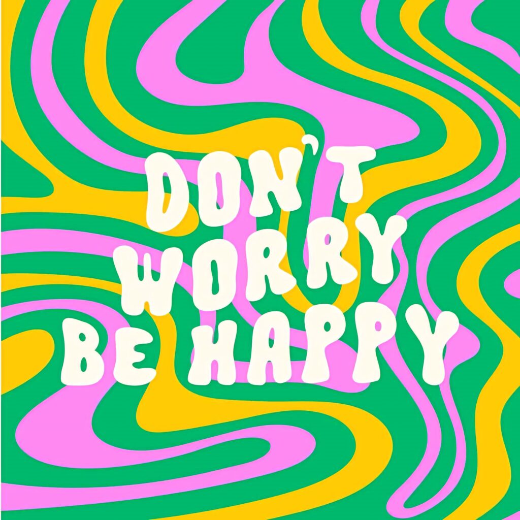 Vibrant Don't Worry Be Happy wallpaper with bold white letters and colorful psychedelic swirls