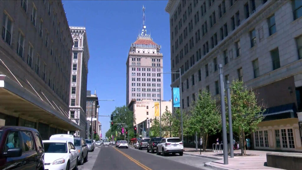 Downtown Fresno Wallpaper: Security Bank & Urban Scene Under Blue Sky