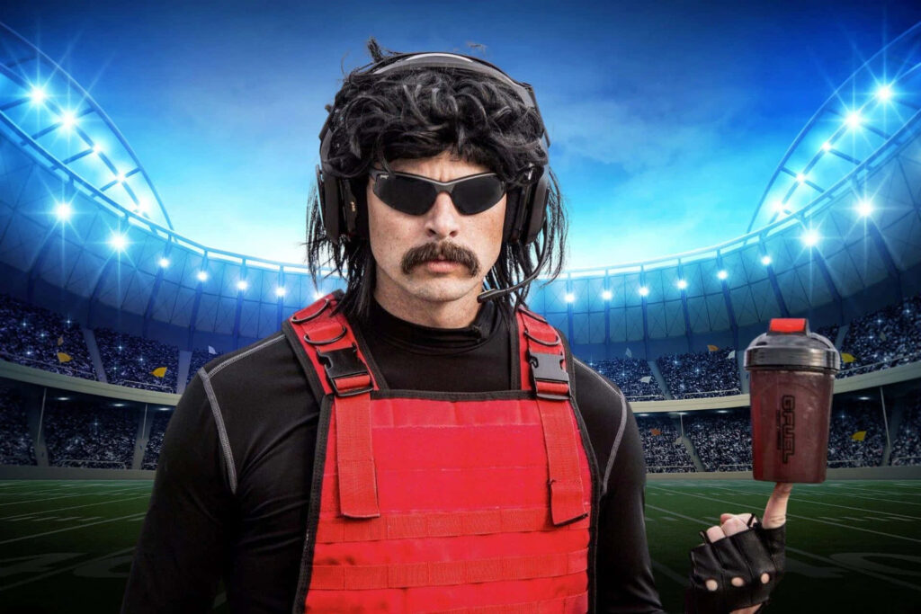 Dr DisRespect in red vest sunglasses and headset on vibrant stadium field with blue lighting Wallpaper