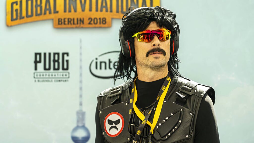Dr DisRespect high-res wallpaper with tactical vest red headset sunglasses gaming event logos background