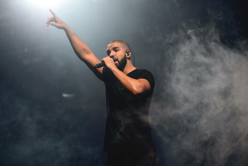 Dynamic Wallpaper: Drake Live on Stage with Dramatic Lighting & Smoke