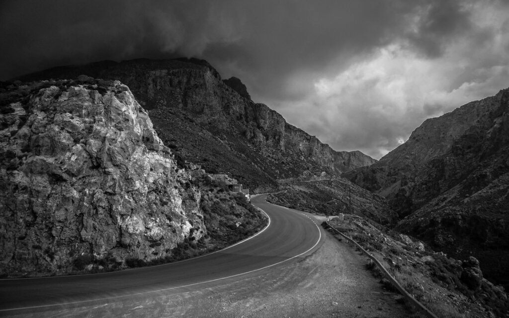 Winding Road in Black and White - Dramatic Mountainous Wallpaper