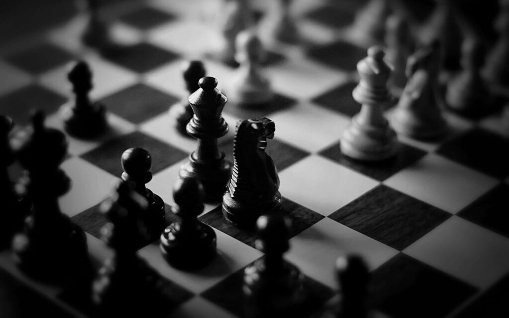 Dramatic Black & White Chessboard Wallpaper for Strategic Atmosphere