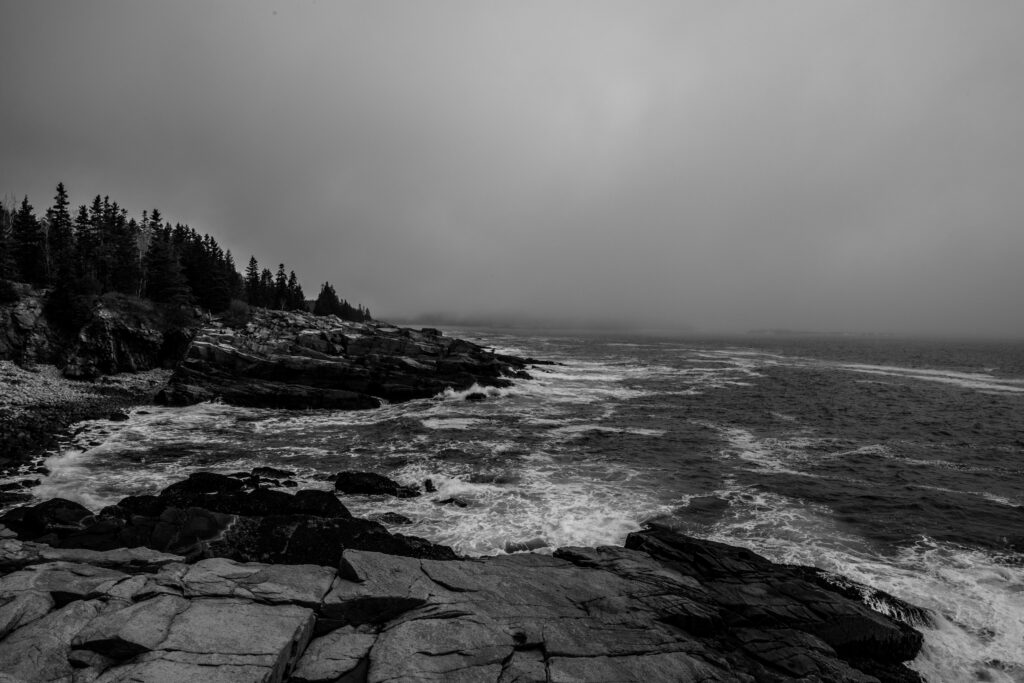 Stunning Black & White Coastal Wallpaper with Rugged Cliff Scene