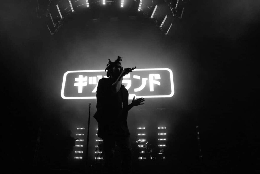 Stunning Black-and-White Wallpaper of The Weeknd on Stage