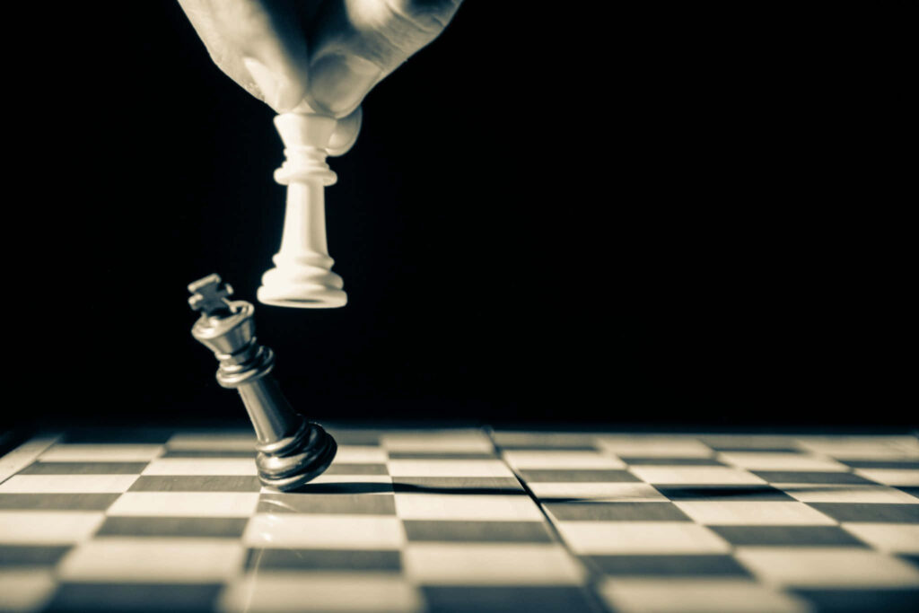Dramatic Chess Game Wallpaper: White King Triumph Against Black King
