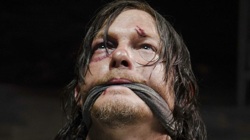 Intense Daryl from The Walking Dead: Dark Dramatic Wallpaper Background