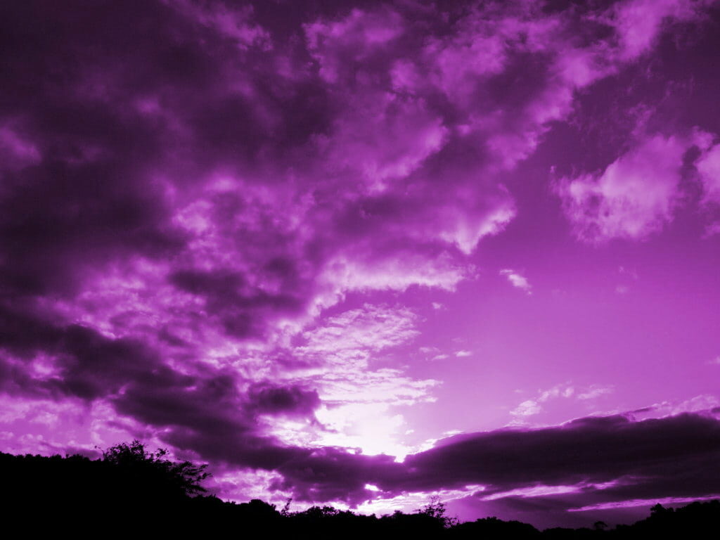 Dramatic Purple Sky Wallpaper: Captivating Day & Night Background