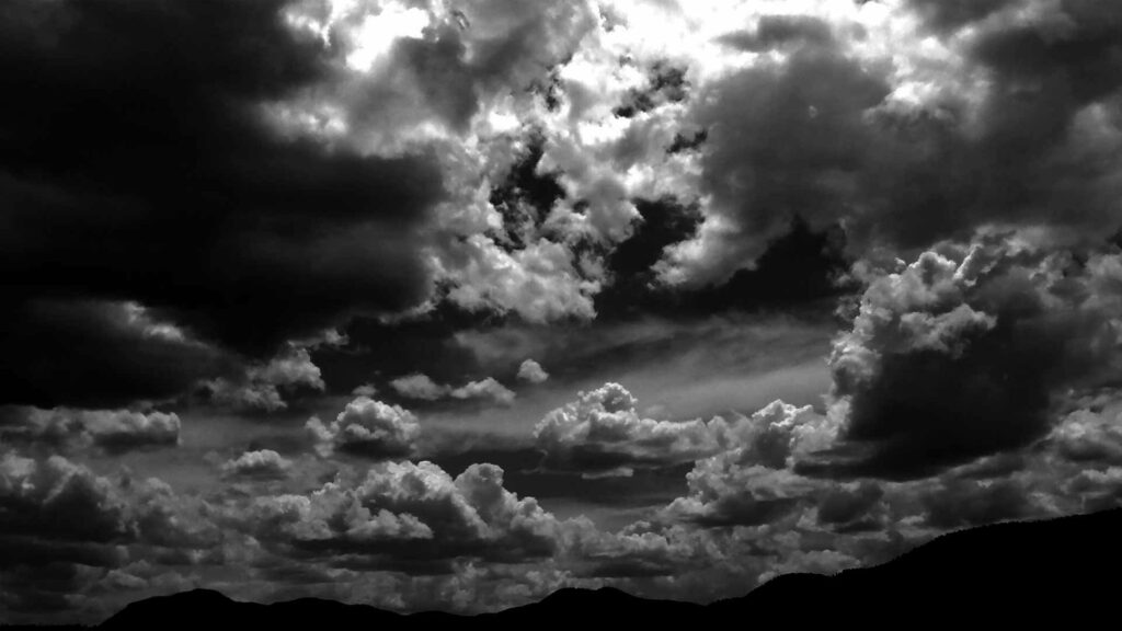 Moody HD Wallpaper: Dramatic Black Clouds & Stormy Sky Background