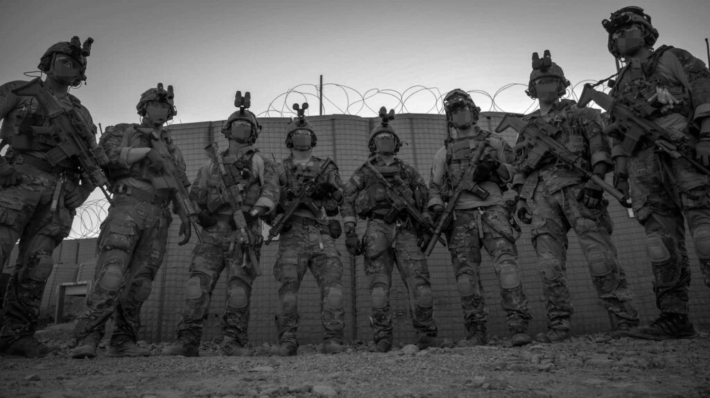 Bold Black-and-White Military Wallpaper: Soldiers with Tactical Gear