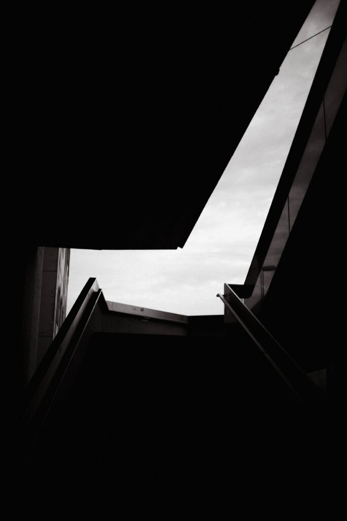 Minimalist Staircase Wallpaper: Dramatic Shadows & Clean Lines