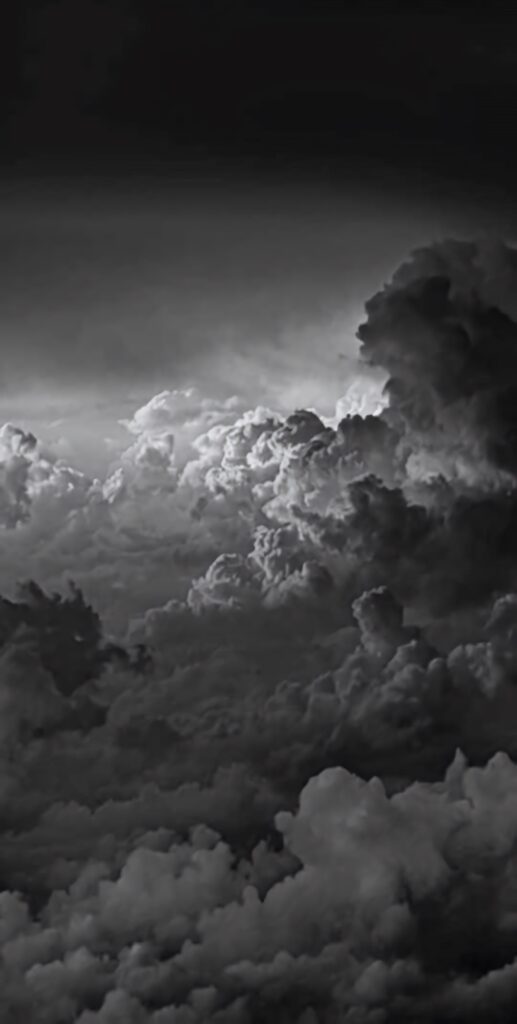 Stunning Monochrome Cloud Wallpaper: Dramatic Light & Shadow Background