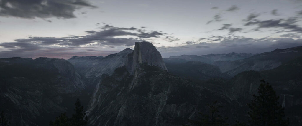 Serene Sunset over Majestic Mountain Range - Nature Wallpaper
