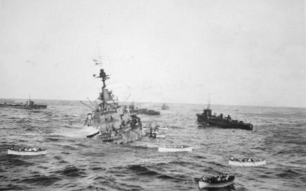 Dramatic Naval Scene Wallpaper: Ships Navigating Choppy Waters