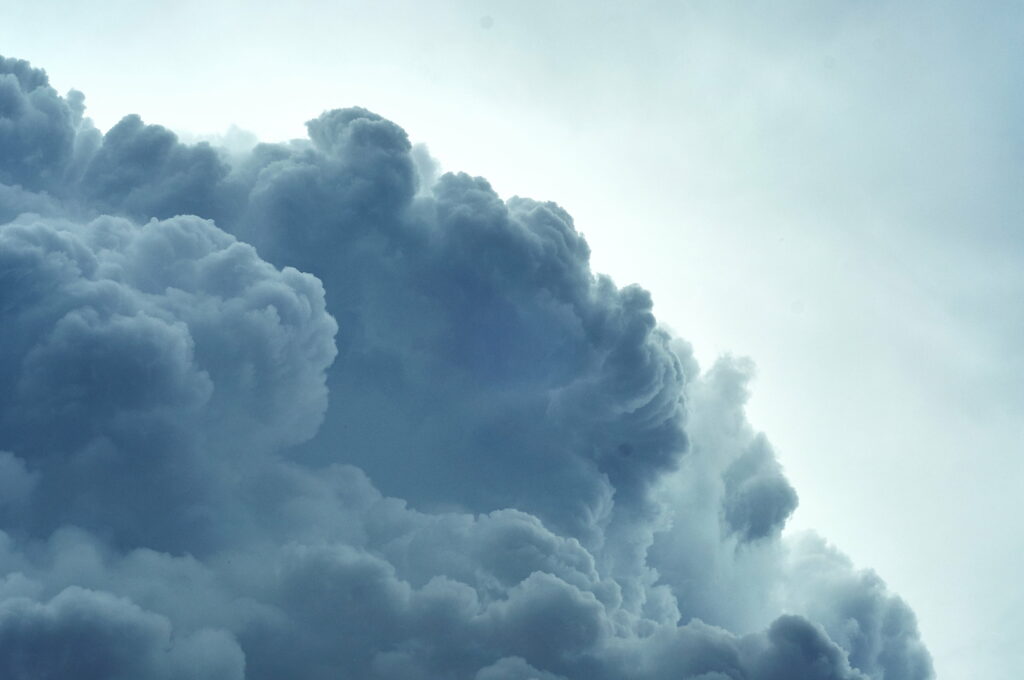 Dramatic Nimbus Clouds HD Wallpaper: Captivating Skyscape Background