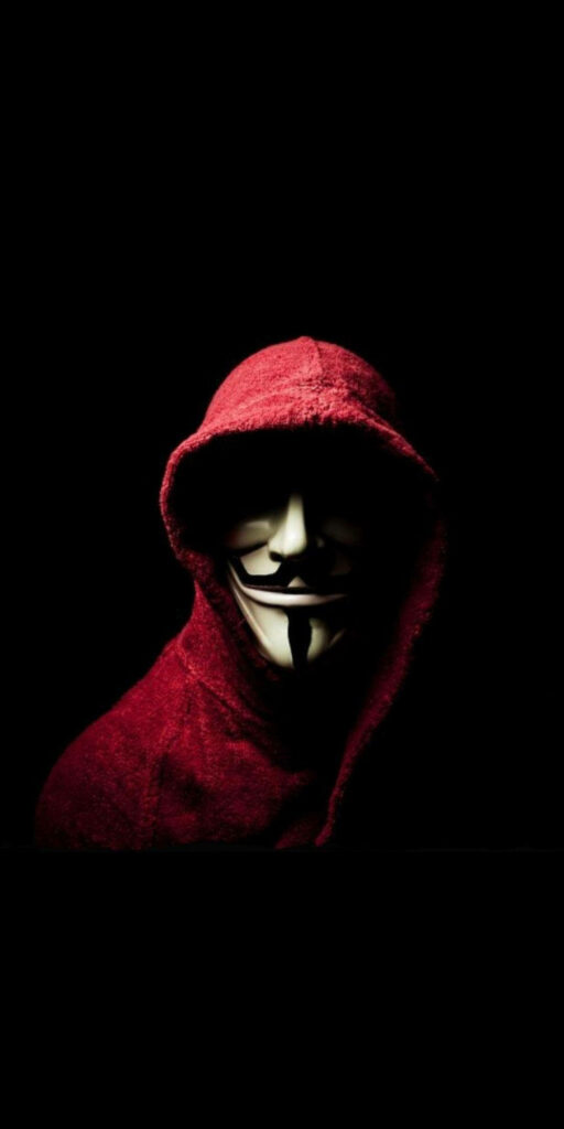 Shrouded in Shadows: Intense Glimpse of the Money Heist Mask Wallpaper