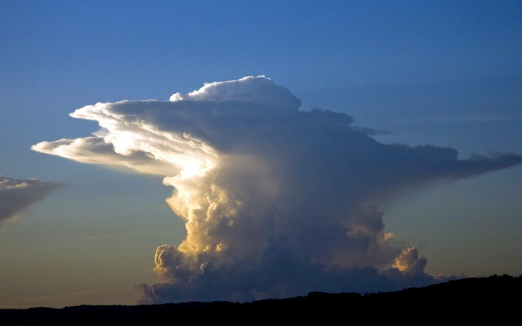Dramatic Storm Cloud HD Wallpaper Against Serene Blue Sky Background