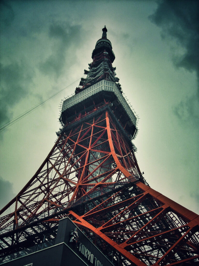 Tokyo Tower Wallpaper: Dramatic Low Angle Against Dark Sky