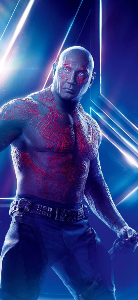 Drax the Destroyer with glowing red tattoos on blue skin against vibrant neon sci-fi background Wallpaper