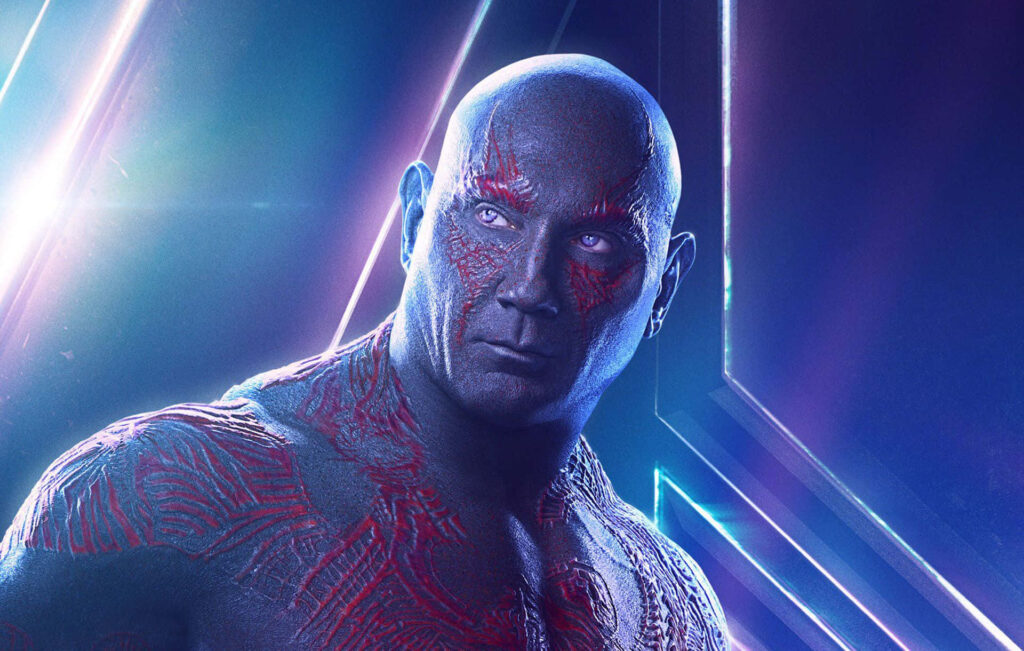 Drax with blue purple neon lighting red tattoos powerful physique sci-fi wallpaper background