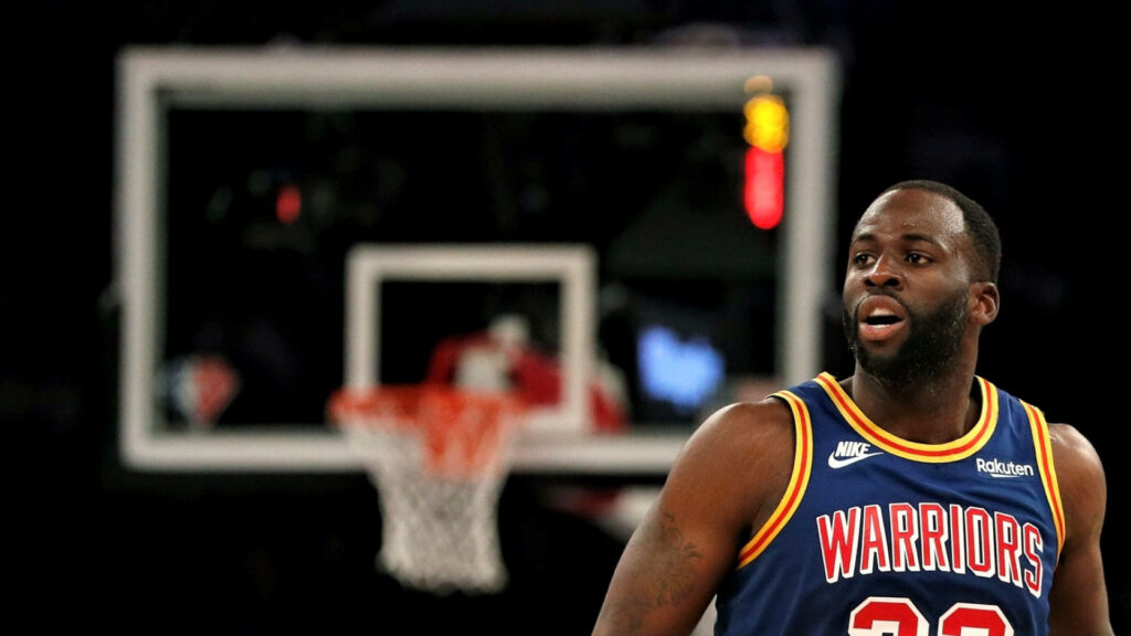 Draymond Green Golden State Warriors intense game moment vibrant basketball arena wallpaper background