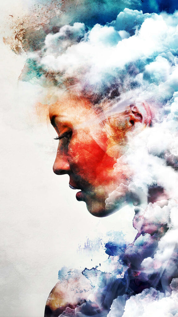 Abstract Wallpaper: Woman's Profile Blended with Colorful Clouds