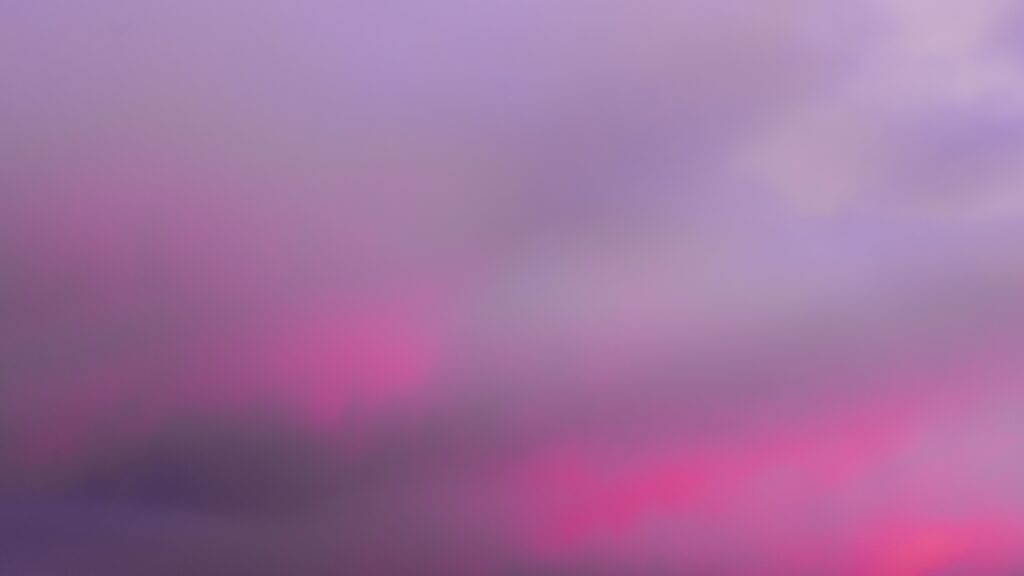 Serene Abstract Sky Wallpaper: Blurred Clouds in Purple & Pink Hues