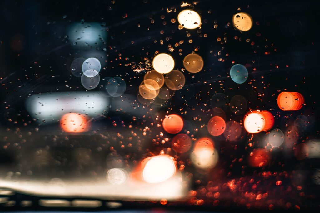 Vibrant Bokeh Wallpaper: Multicolored Lights & Dreamy Raindrops