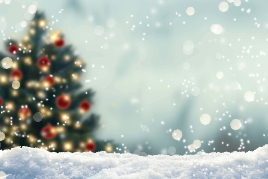 Dreamy Christmas Scene: Blurred Tree with Glowing Lights & Snow Wallpaper