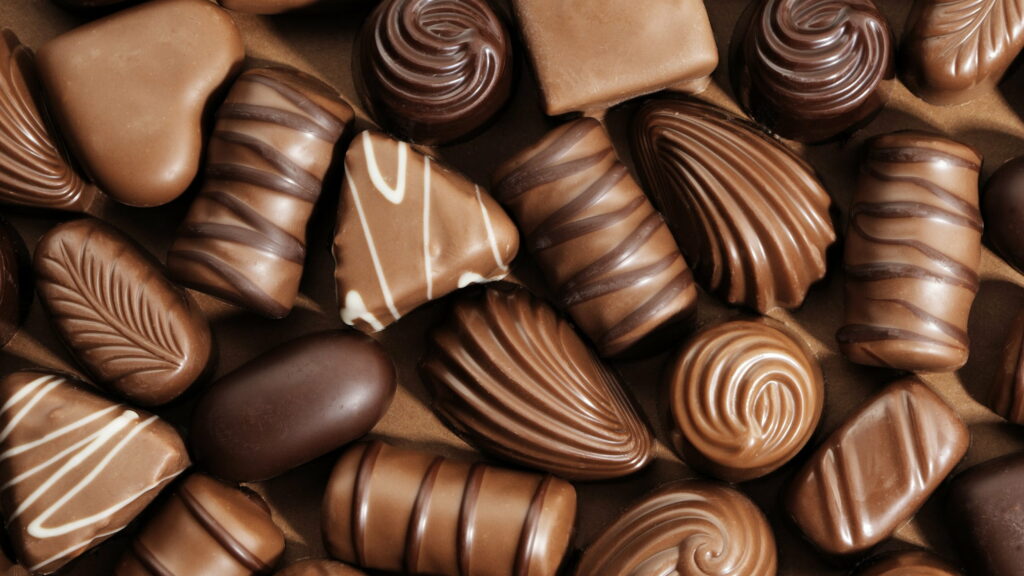 Delectable Assortment of Chocolates: A Scrumptious Feast for the Eyes Wallpaper