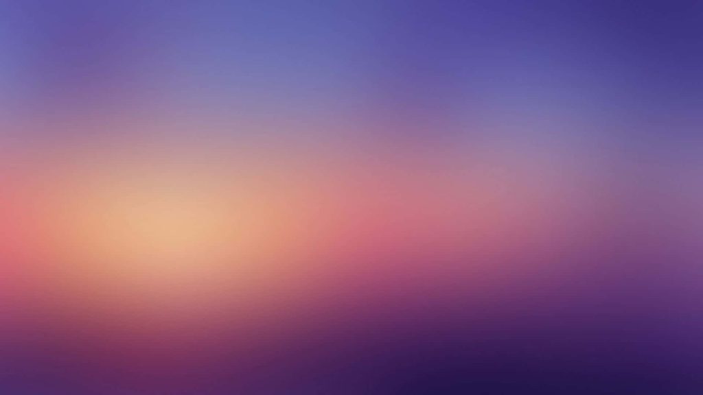 Dreamy abstract wallpaper with lavender purple pink gradient and warm glowing peach accent background