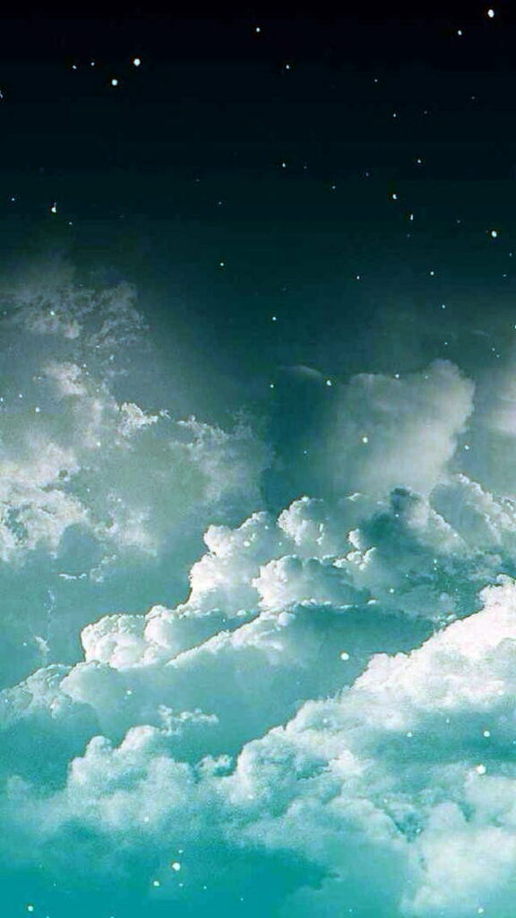 Tranquil Dreamy Sky Wallpaper: Fluffy Clouds on Deep Blue Background
